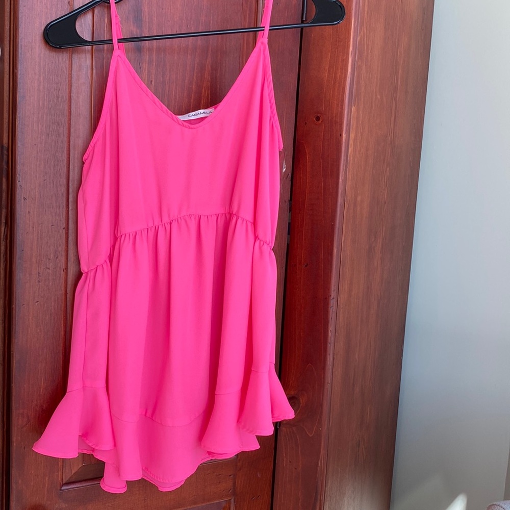 Neon pink tank top, size small. Caramela brand. Good condition. 100% polyester
